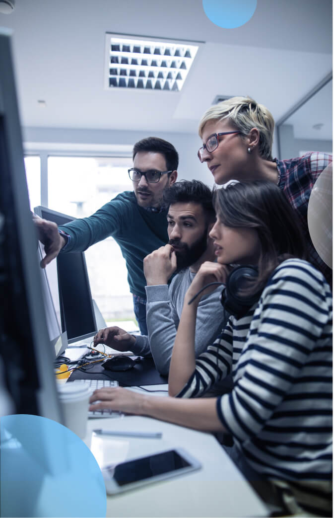 Group of people looking at Monitor